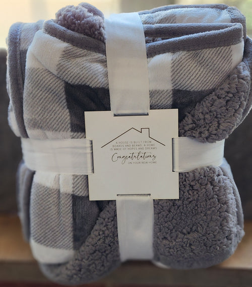 engraved wooden gift tag on blanket