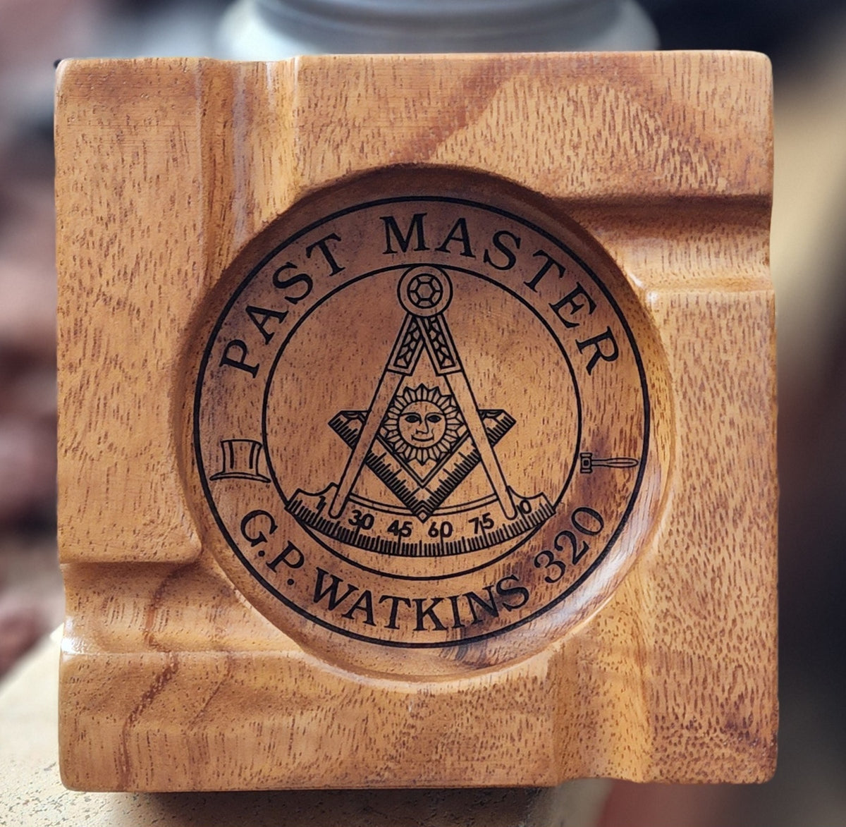 Wooden block with 'Past Master' engraving and Masonic symbol